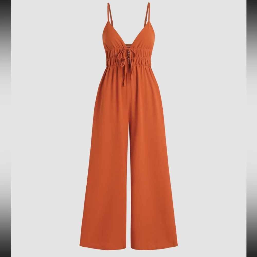 SOLID SHIRRED KNOTTED V-NECK JUMPSUIT